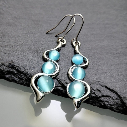 Creative curve wavy Earrings inlaid with blue cat's Eye gems